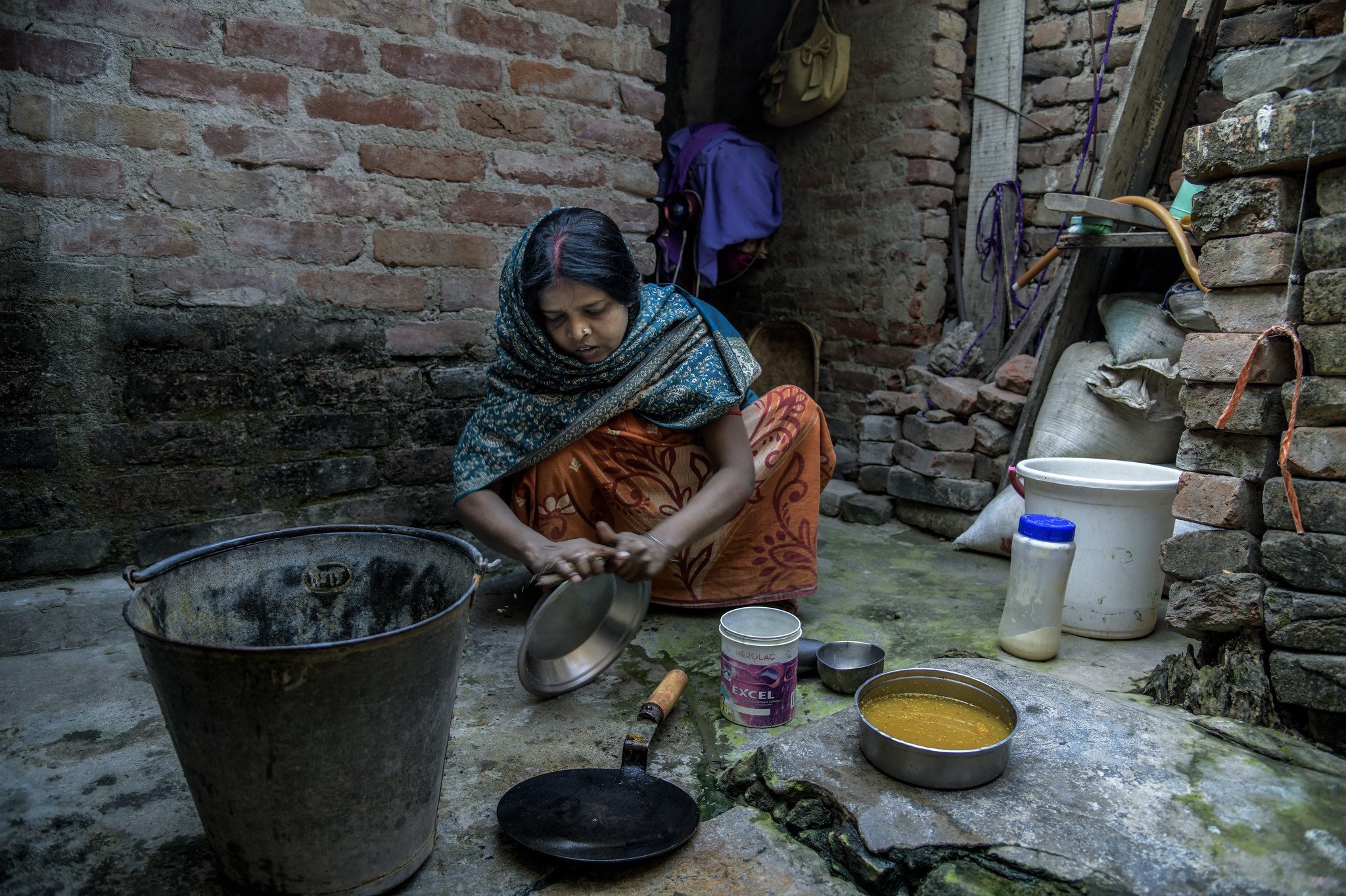 High rents in cities like Mumbai and New Delhi have forced poor people into crowded and cramped living spaces where they share communal toilets and water facilities, leaving them at greater risk of contracting COVID-19. 